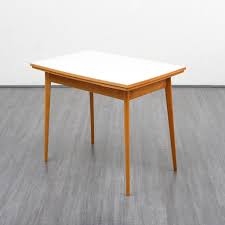 While most kitchen tables from 1950s have a formica top. 1950s Extendable Vintage Kitchen Table 88115