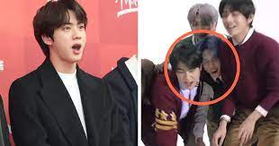 · jin has been known for his broad shoulders that armys call him ' . Bts Jin S Shoulders Are So Wide They Could Be Used As Weapons Koreaboo