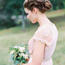 These bridesmaids opted for side parts and big, glossy barrel curls, which works well as a hairstyle that's consistent but still adaptable for different hair lengths, styles, and textures, too. 48 Wedding Hairstyles Perfect For Your Bridesmaids