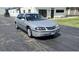 Image result for Medium Green 2002 Impala