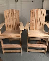 I Decided To Build Some Adirondack Style Chairs For My Deck Went Tall So The Deck Rail Didn T Block M Outdoor Chairs Wooden Patio Chairs Adirondack Chairs Diy