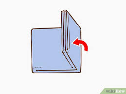Laying them down on a counter or on a bed makes it easy to smooth and fold. 3 Ways To Fold Bath Towels Wikihow