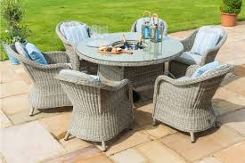 The bronte 8 seater square garden dining set is stronger and more durable than cheaper sets on the market and has been handmade in the uk from sustainably sourced scandinavian redwood. Maze Rattan Oxford 6 Seat Round Ice Bucket Dining Set With Heritage Chairs