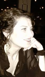 A lioness appears to stare at buzzing flies overhead in this intimate  wildlife moment captured by Your Shot photographer David Chen in Tanzania.