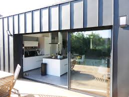 Il ne retire en rien le côté. Renovation Maison Avec Extension Zinc Et Terrasse Bois A Angers