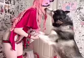 Sexy girl with pink hair makes out with her dog