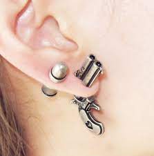Pin By Che Kuhse On Guns Fake Gauge Earrings Gauged Earrings Rock Punk Style