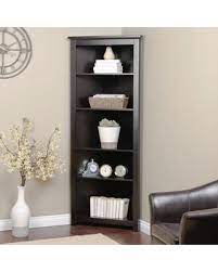 Beautifully display your curated collections with pride in this lighted corner curio cabinet. Finley Home Redford Black Corner Bookcase From Hayneedle Bhg Com Shop Corner Bookshelves Corner Furniture Corner Shelf Ideas