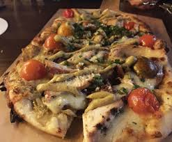 at 716 the game is all about expectations gusto chicken flatbread food parmesan salad