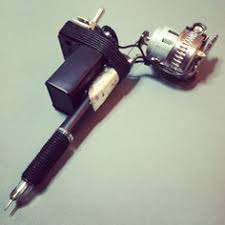 Iight i made a great tattoo gun ima tell yall how i made it you open up a vcr and take out the motor thats inside of it it isnt a flat motor but it will work then there should be a litttle place were u could stick the needle on the side and u jus get some indian ink and start using. Homemade Tattoo Guns