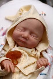 So one of the coolest things ever is that I get to paint this extremely  rare little face. "Lily" by Denise Farmer, produced in 2007! :O (6 years  before I started reborning).