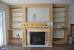 Built Ins Around Brick Fireplace