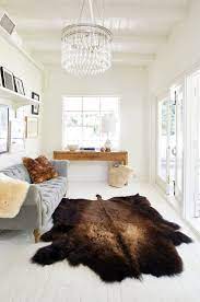 Transform Your Space With Our Unique Rugged Buffalo Robe Rug Its Long Fur Pile That Feels Rugs In Living Room Living Room Rug Placement Hide Rug Living Room