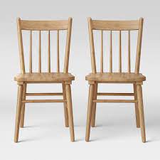 Modern dining chairs can be made of wood, metal, plastic, or upholstery and come in a large variety of colors ranging from neutral palettes to more bold colors to add an accent to the dining room. Set Of 2 Hassell Wood Dining Chair Natural Threshold Target