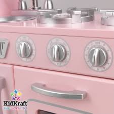 It also features a removable sink for easy cleanup. Kidkraft Vintage Play Kitchen In Pink 53179