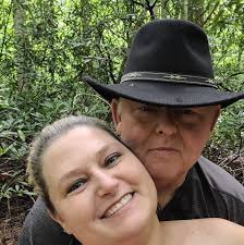 MSU President Mark Keenum presented a special ceremonial cowbell to  retiring MSU Foundation Executive Director of Communications and Donor  Relations Cathy Lammons in recognition of her 36 years of distinguished  service to