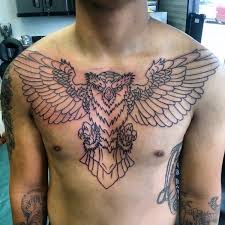 Silver owl head tattoo shape in the dark. 70 Traditional Owl Tattoo Designs For Men Wise Ink Ideas