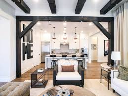 Exposed ceiling beams add visual interest, textural detail, and a framing quality that makes other elements pop. Add Wood Beams To Your Home For A Bold Design With Neutral Colors