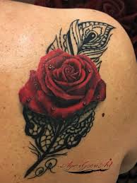 Red Rose With Line Work Feather Tattoo By Agnes Tattoo Anansi Munich Germany Artist Rose Tattoo On Ankle Feather Tattoo Rose Tattoos For Women