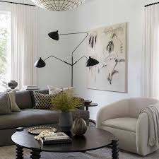 Sandy tones of light beige make this beachy living room exude comfort. The Best Modern Living Room Lighting Ideas