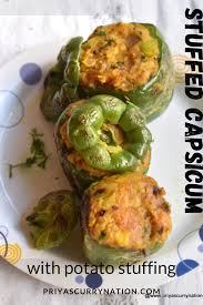 Stuffed Capsicum Recipe Bharwan Shimla Mirch Recipe Stuffed Bell Peppers Curry Nation Recipe In 2020 Capsicum Recipes Recipes Stuffed Peppers