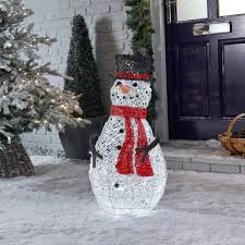Snowman features a black top hat, red scarf, carrot nose, button eyes, and green mittens. Led Rattan Snowman Christmas Figure 70cm Light Up Indoor Outdoor Snowman On Onbuy