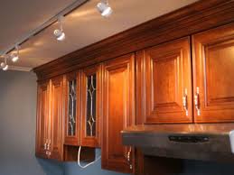 Ceiling light is slightly suspended underneath the ceiling while flush ceiling light is attached flush right to kitchen ceiling. Kitchen Makeover Replacing A Kitchen Ceiling Hgtv