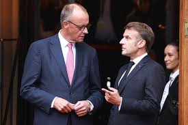 Macron turns to Merz as French parliament nears collapse | Euractiv
