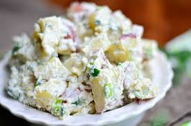 Meanwhile, in a large bowl, whisk together sour cream and mayonnaise; Potato Salad Serves 10
