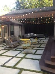 Square And Rectangle Concrete Forms With Turf Grass In Between Furniture Is From West Elm Concrete Backyard Patio Extension Ideas Outdoor Patio Decor