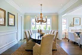 Keep things subtle by painting your chair rail and other moldings in a monochromatic color scheme. Dining Room Decorating Ideas With A Chair Rail