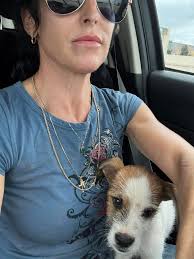 Who to call to return a found dog in Fulshear?