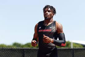 A university of georgia track athlete was impaled by a javelin during practice, narrowly missing his heart. Georgia S Elija Godwin Once Impaled By Javelin Earns Medal At Tokyo Olympics