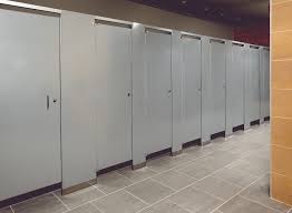 Granite partitions are combined with stainless steel components for a formal bathroom design. Hadrian Bathroom Stalls