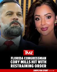 Florida Congressman Cory Mills has been hit with a restraining order after  his ex-girlfriend, Lindsey Langston, claimed he'd threatened to release her  sex tapes. FULL STORY IN BIO!