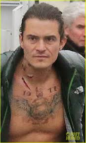Katy perry und orlando bloom verbringen aktuell ein paar tage in venedig. Orlando Bloom Gets Shirtless With Fake Tattoos For Unlocked Photo 3247358 Orlando Bloom Shirtless Pictures Just Jared