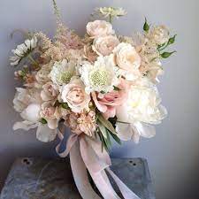 (photographer leah marie photography lowers sacred romance floral) // (above right) a bouquet inspired by shakespeare midsummer night's dream, this whimsical ramble of white peonies is. The Bridal Bouquet Will Be A Loose Clutch Bouquet Of Ivory Peonies Blush Spray Roses White Scabiosa Jasmine Vin Pink Bouquet Bridal Bouquet Wedding Bouquets