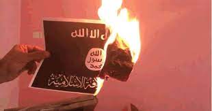 The top white writing says there is no god but allah god. The Latest Viral Challenge Is Isis Flag Burning