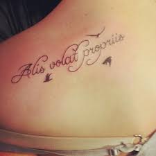 First Tattoo She Flies With Her Own Wings Tattoo Pretty Tattoos Feather Tattoos Foot Tattoo