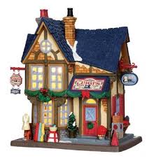 Dickens' village series open the door to victorian england which at the time of charles dickens was the center of culture for the world and where many traditions we celebrate today took shape. Lemax Christmas Village Luigis Custom Tailor Buy Online In Austria At Desertcart At Productid 24131350
