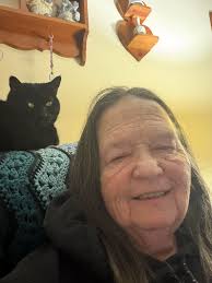 Hi all! I just wanted to introduce myself and share a photo I took this is  me and my cat Hazel