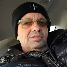 Is a car parked in front of a driveway legally parked if it blocks the  driveway?