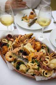 A delicious italian christmas eve menu from the starter to the side dish, all strictly made with fish, of course. Italian Christmas Eve Food The Feast Of The 7 Or 13 Sea Food Shrimp Calamari Octopus Calms Scollops Fish Salad Food Italian Recipes Seafood Recipes