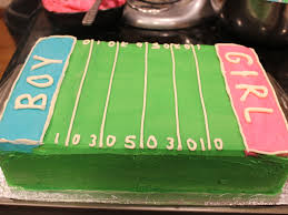 Pop in some bubblegum and blow a bubble to reveal the gender of your newest addition! Gender Reveal Cake Football Themed Blue Frosting On The Inside Yum Cakecentral Com