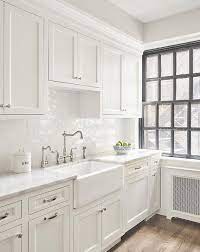 But don't call it safe. Glossy White Glazed Subway Tiles Transitional Kitchen