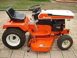 A 1950s housewife brings her husband a cool drink after a morning of hard work made easy with this garden tractor. Simplicity Garden Tractor For Sale Off 57