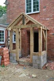 The primary roof is a hip roof. 76 Front Porch Ideas Porch Porch Kits Timber Frame Porch