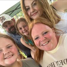 What fish are hitting the water surface at Lewis Smith Lake?