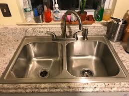 countertop next to kitchen sink
