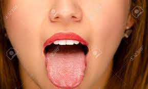 Closeup Young Womans Open Mouth With Tongue Sticking Out. Stock Photo,  Picture and Royalty Free Image. Image 55226600.